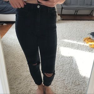 Black knee ripped jeans